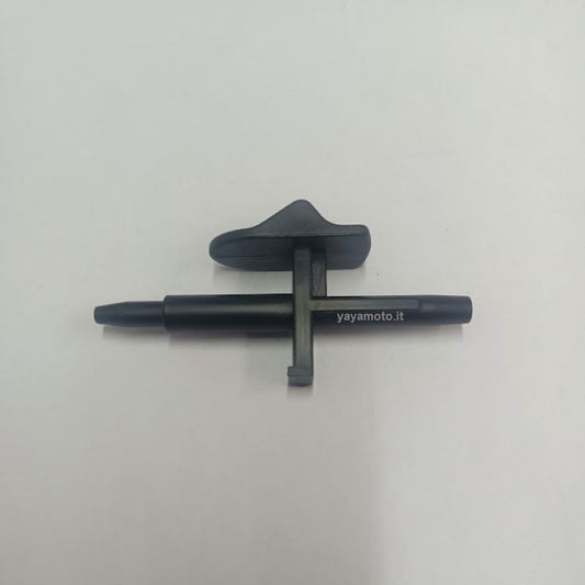 Pulsante blocco maniglia tagliasiepi